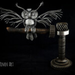 Skulptur Eule auf einem Ast